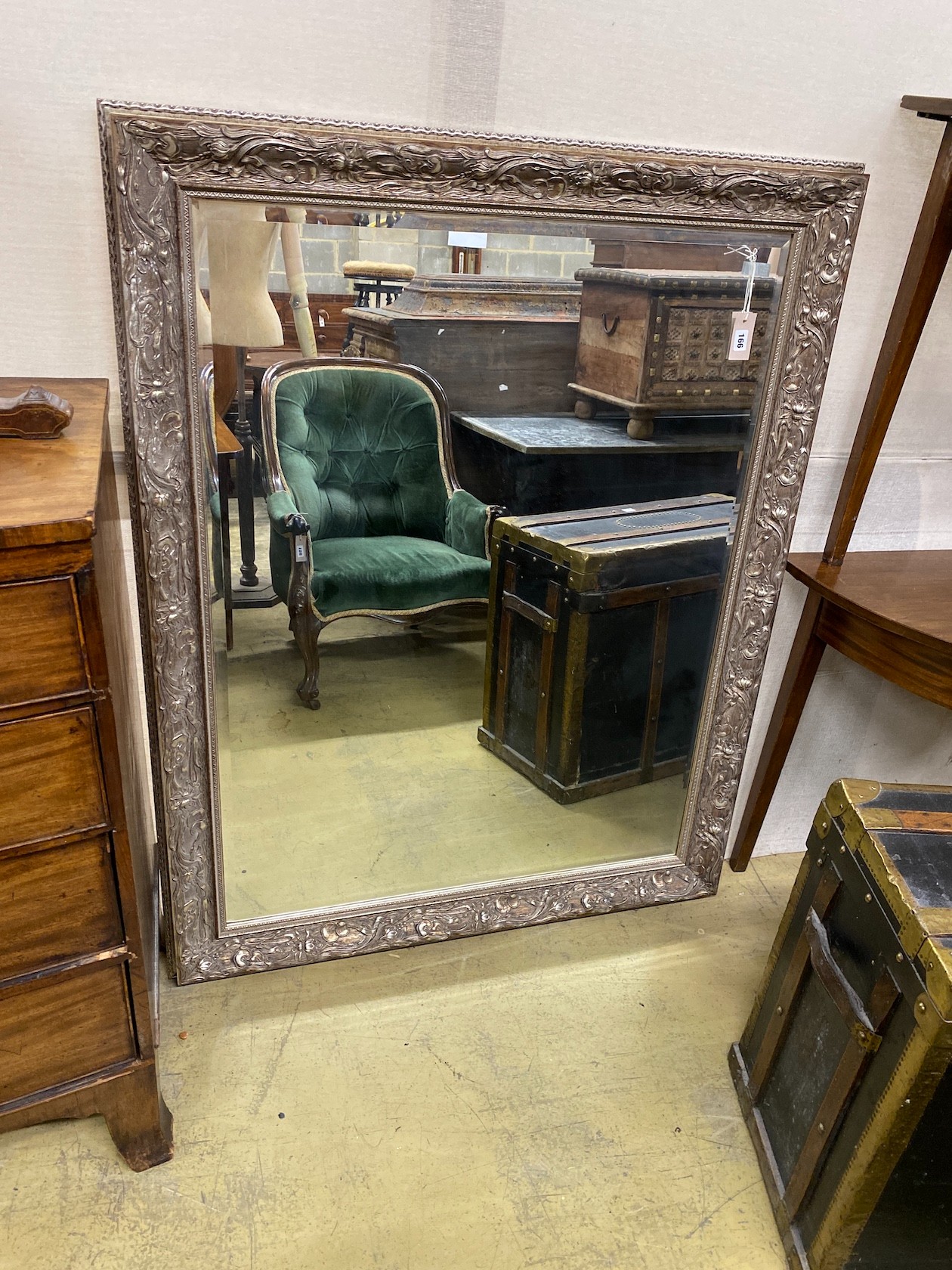 An Art Nouveau style rectangular silvered wall mirror, width 107cm, height 137cm